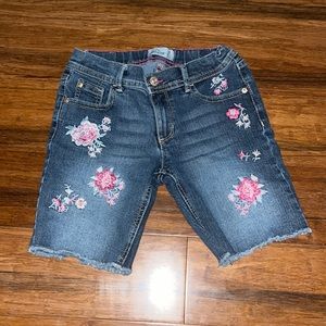 Girls dark blue floral shorts. Size 10 US.